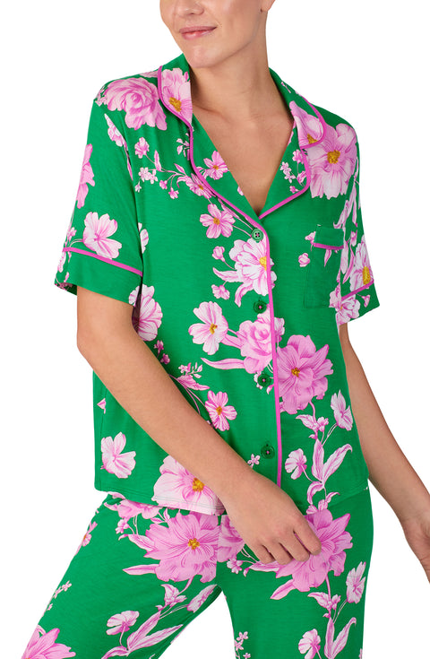 A lady wearing DAKOTA PJ SET IN EMERALD BLOOMS