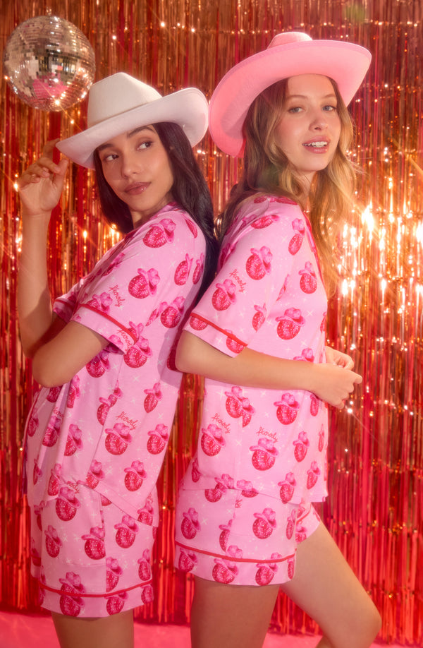 two ladies wearing Aspen Knit Pj Set In Cowgirl Disco print