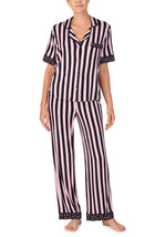 A lady wearing DAKOTA PJ SET IN BLUSHING STRIPE