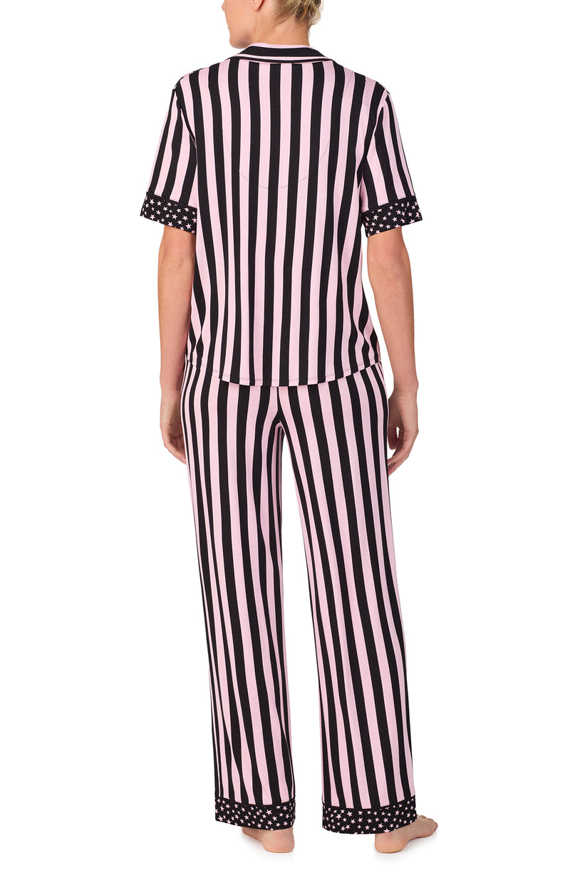 A lady wearing DAKOTA PJ SET IN BLUSHING STRIPE