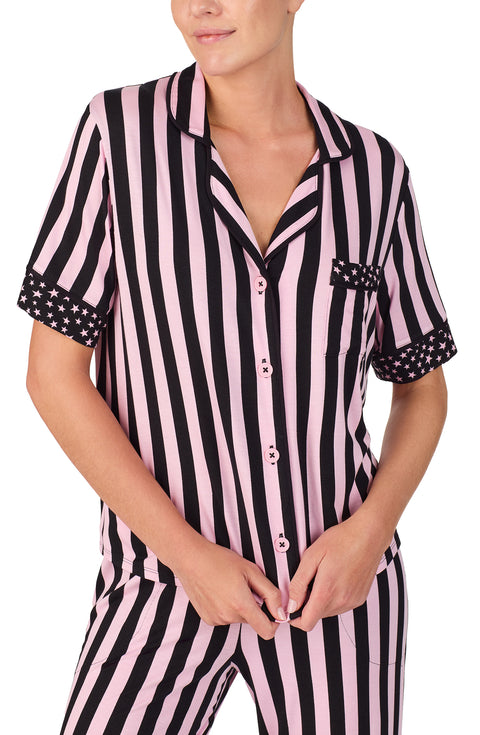 A lady wearing DAKOTA PJ SET IN BLUSHING STRIPE