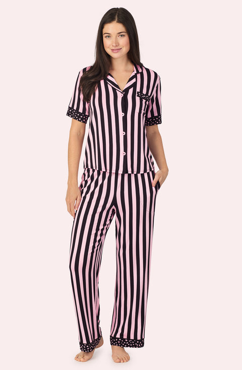 A lady wearing DAKOTA PJ SET IN BLUSHING STRIPE