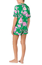 A lady wearing ASPEN PJ SET IN EMERALD BLOOMS