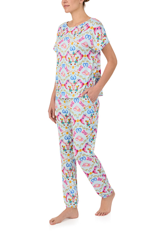 A lady wearing Layna Knit Pj Set In Western Charm print