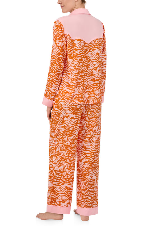 A lady wearing Dolly Woven Pj Set In Blushing Zebra print