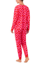 A lady wearing Lorena Knit Long Pj Set In Heartbreaker print