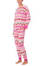 A lady wearing Lorena Knit Long Pj Set In Fa La La Fairisle print