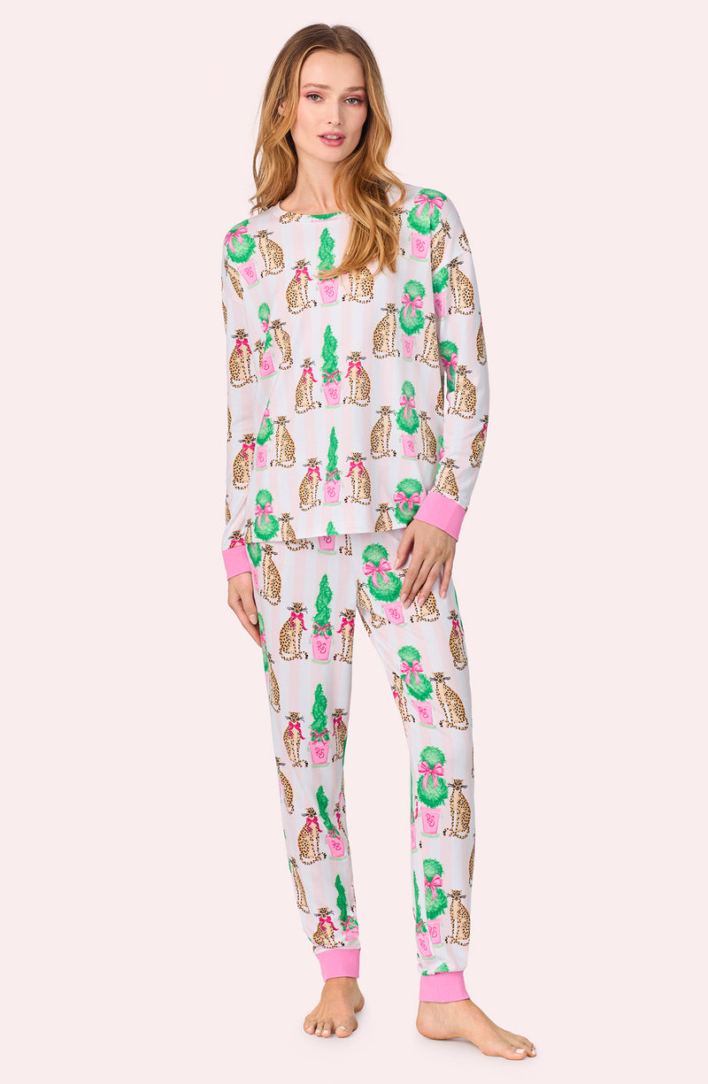 A lady wearing Lorena Knit Long Pj Set In Feline Festive print