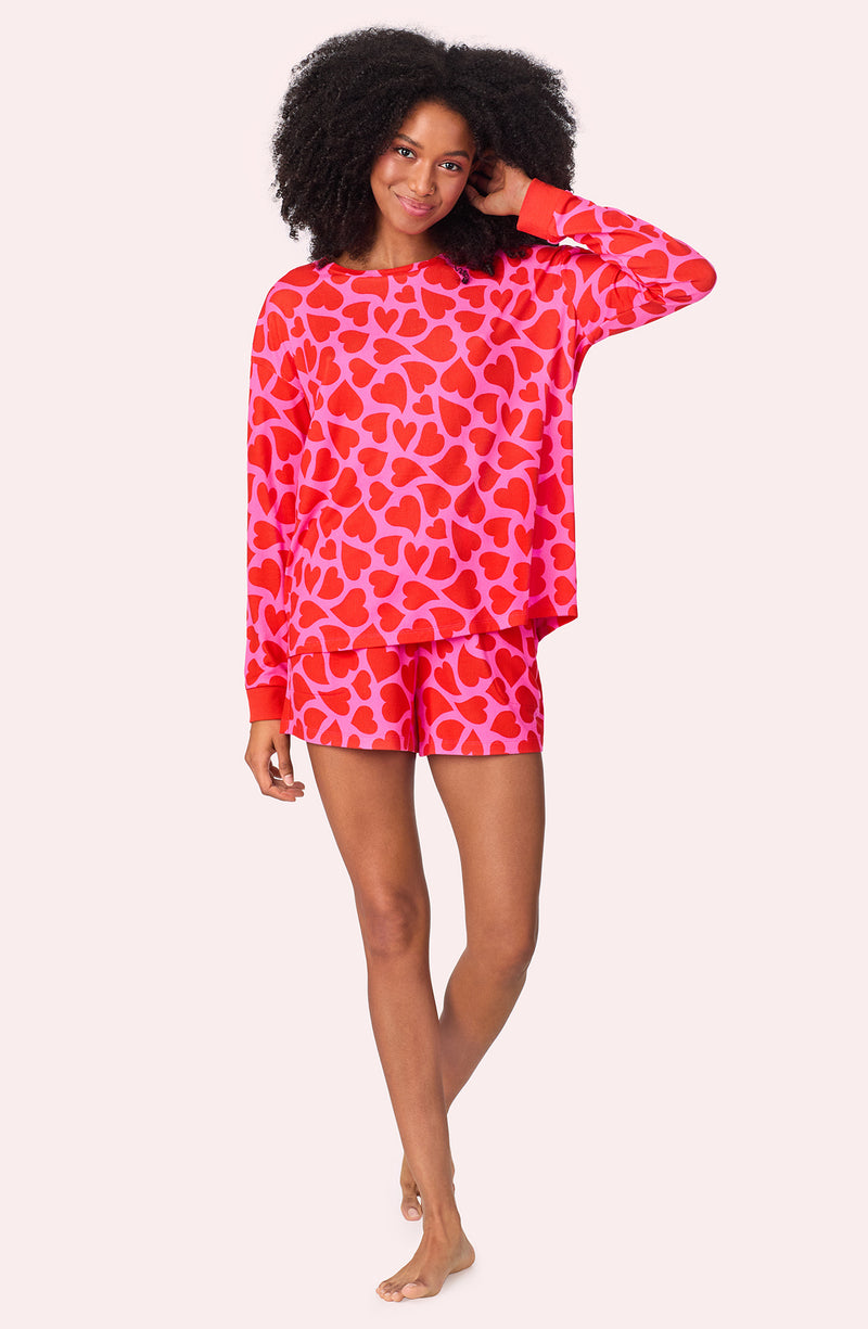 A lady wearing Lorena Knit Short Pj Set In Heartbreaker print