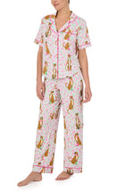 A lady wearing Vienna Knit Pj Set In Feline Floral print