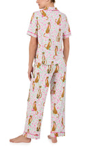 A lady wearing Vienna Knit Pj Set In Feline Floral print