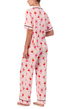 A lady wearing Dakota Pj Set In Giraffes On Pointe