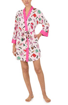 A lady wearing Nadia Knit Robe In Shopping Spree print