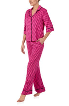 A lady wearing quarter sleeve Gramercy Woven Pj Set In Sweet Bee with bee geo print.